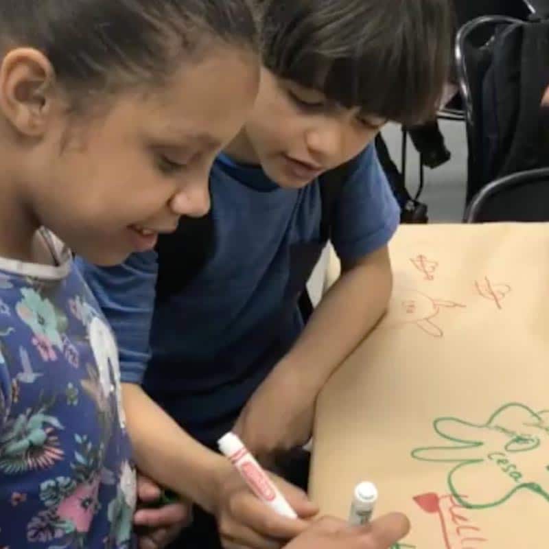 Counseling in Schools young student drawing as an example of art therapy