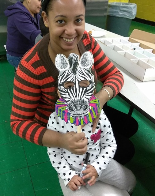 Counseling In Schools Success Story: Family Fun Day. Child in a Zebra Mask