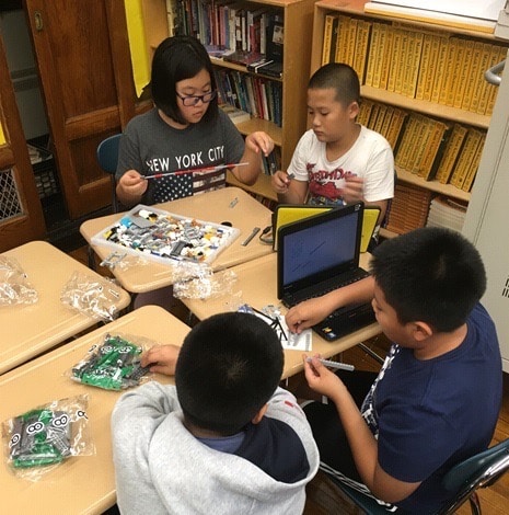 Counseling In Schools Success Story: Of Robotics and Self-Confidence. Students studying lego robotics