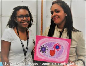 Julissa Rivera and her mother display the painting they created together at a Counseling In Schools Family Engagement event at a Bronx high school. Consider donating to Counseling In Schools.